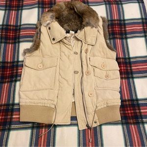 Tan vest with fur on the collar